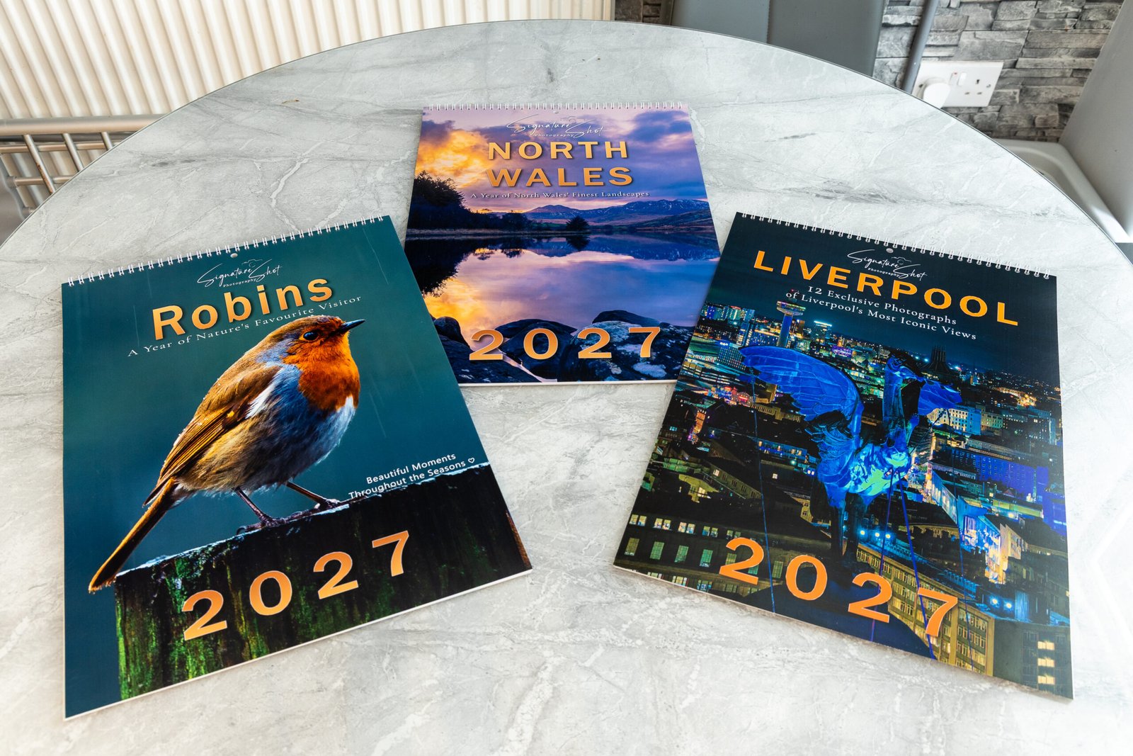 Robin, North Wales and Liverpool calendar front covers